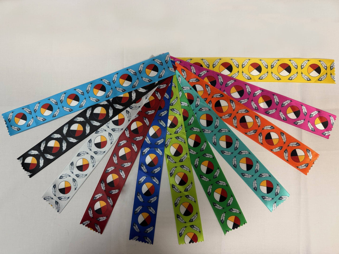 Medicine Wheel satin ribbon with 11 colors from the 7 Grandfathers Collection by Indigenous artist Jessica Somers. In stock for wholesale purchases.